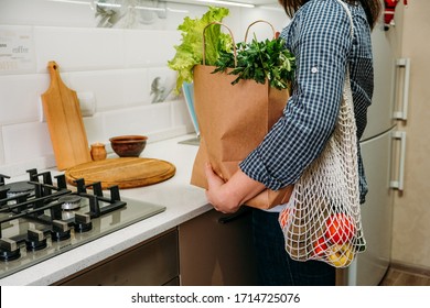 Farmers Cheap Food Delivery. Direct Delivery From Farms, Buy Local, Support Small Food Business. Woman Unpacks Shopping Bag With Fresh Organic Vegetable Products In The Kitchen At Home