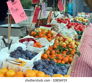 farmer's market fruit display showing many fruits