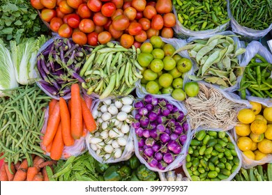 Farmers market with various domestic colorful fresh fruits and vegetable. Tasty colorful mix.