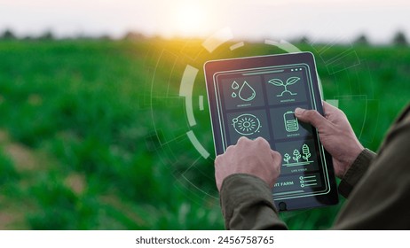 Farmers use agricultural technology in data analysis tablets and image icons. New technologies in agricultural business concepts. Men use tablets to research and develop plant varieties, agricultural  - Powered by Shutterstock