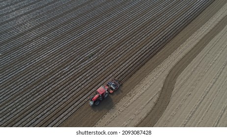 Farmers Use Planters To Plant Plastic Coated Peanuts On Farms, North China