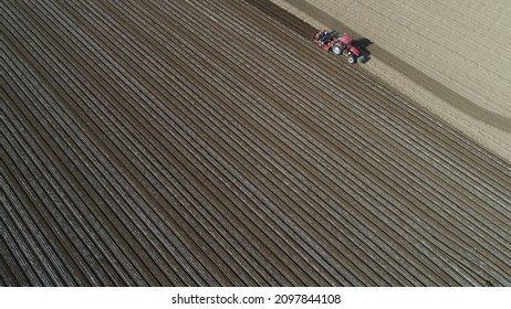 Farmers Use Planters To Plant Plastic Coated Peanuts On Farms, North China