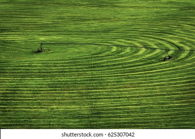 Farmfield with circle pivot irrigation sprinkler - Powered by Shutterstock