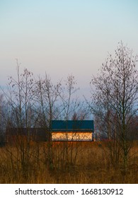 Farming house during dramatic sunset