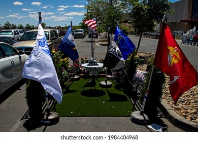 Farmington, New Mexico USA - May 30 2021:Memorial Day Tribute Of Flags Set Up In Lowes Hardware Store Parking Lot Space Reserved For Veterens.