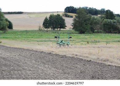 Farmland With Some Old Farm Equipment