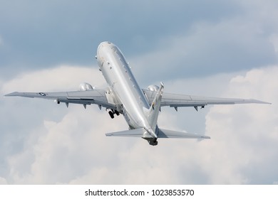 FARNBOROUGH, ENGLAND - JULY 8 2014: Take Off Of P8-A Poseidon Displaying At The Farnborough International Airshow With Bombay Opening