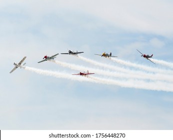 Farnborough - July 19, 2014: Aerostars aerobatic display team in YAK-50s performing aerial acrobatics