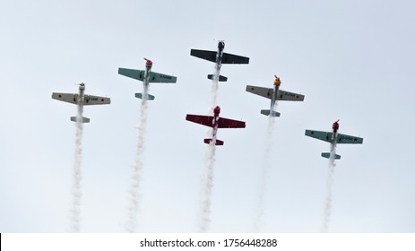 Farnborough - July 19, 2014: Aerostars aerobatic display team in YAK-50s performing aerial acrobatics