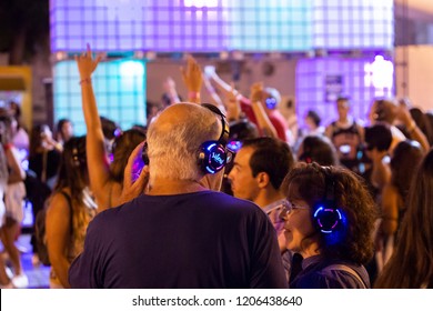 FARO, PORTUGAL: 30th AUGUST, 2018 - Audience Enjoying Music In Headphones On Festival F, A Silent Disco Concept.