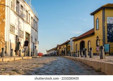 Faro, Portugal, September 2022: Low Angle View On A Cobblestoned Street In The Old Town Of Faro.