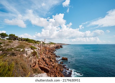 Farol da Guia Lighthouse. Beautiful landscape. Atlantic ocean rock shore, Portugal.