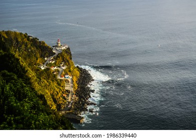 Farol do Arnel, Scenic Road, Beautiful Lighthouse on the Coast of Sao Miguel Island, Atlantic Ocean, Azores, Portugal