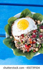 Farro Bowl With
Feta, Chickpeas, Green Beans, Red Peppers,cranberries, Spinach,walnuts,fried Egg And Honey-lemon Vinaigrette