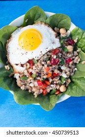 Farro Bowl With
Feta, Chickpeas, Green Beans, Red Peppers,cranberries, Spinach,walnuts,fried Egg And Honey-lemon Vinaigrette