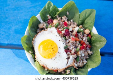 Farro Bowl With
Feta, Chickpeas, Green Beans, Red Peppers,cranberries, Spinach,walnuts,fried Egg And Honey-lemon Vinaigrette