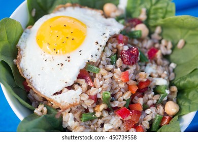 Farro Bowl With
Feta, Chickpeas, Green Beans, Red Peppers,cranberries, Spinach,walnuts,fried Egg And Honey-lemon Vinaigrette