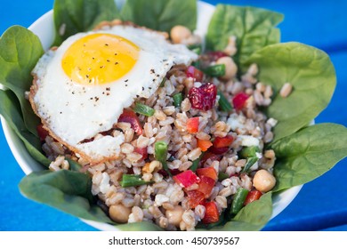 Farro Bowl With
Feta, Chickpeas, Green Beans, Red Peppers,cranberries, Spinach,walnuts,fried Egg And Honey-lemon Vinaigrette