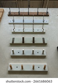 A fascinating array of utility hooks is on display, showcasing a wide range of diverse designs that offer effective and innovative storage solutions suitable for both homes and workspaces