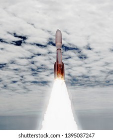 Fascinating rocket launch with dramatic clouds. The elements of this image furnished by NASA.