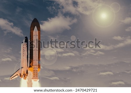   Fascinating rocket launch with dramatic clouds. The elements of this image furnished by NASA.