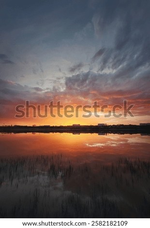 Similar – Image, Stock Photo A tranquil evening scene with typical Dutch houses and a windmill reflected in the calm waters of Zaanse Schans