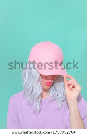 Fashion aesthetic blonde girl in trendy summer accessories. Pink cap Vanilla Pastel colours outfit
