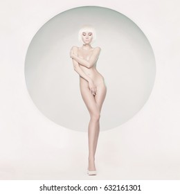 Fashion art studio photo of nude sensual woman with beautiful makeup