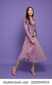 Fashion Asian Female Model. Lilac Leather Jacket, Lilac Skirt, Heels, Sunglasses. Asian Fashion