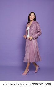 Fashion Asian Female Model. Lilac Leather Jacket, Lilac Skirt, Heels, Sunglasses. Asian Fashion