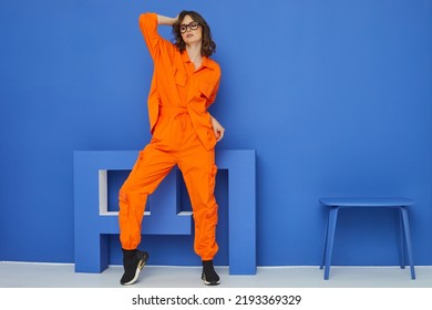 Fashion Asian Female Model In Orange Trendy Suit. Asian Fashion