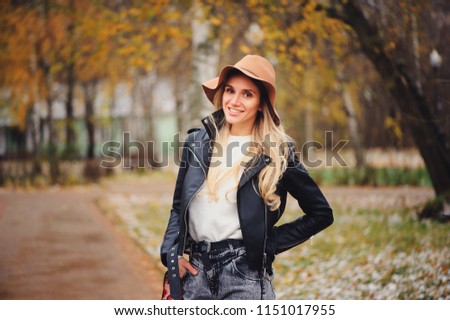 Similar – fashion autumn portrait of young happy woman walking outdoor