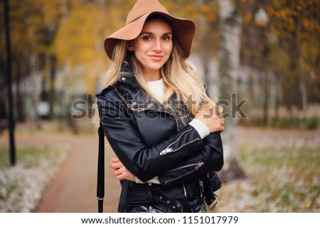 Similar – fashion autumn portrait of young happy woman walking outdoor