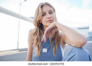 Fashion, Beauty And City With A Model Woman Outdoor On The Road Or Street For Contemporary And Edgy Style. Portrait, Trendy And Clothes With An Attractive Or Stylish Young Female In An Urban Town