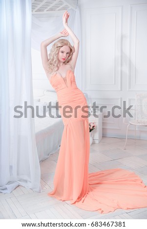 Fashion Beauty Portrait. Beautiful Girl, Model Woman wearing Long evening Chiffon dress.