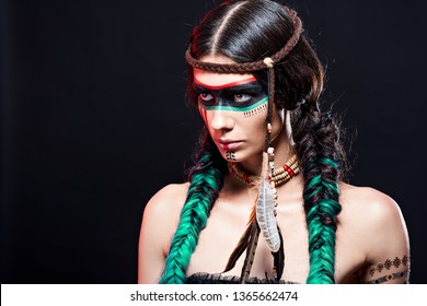 Fashion And Beauty Shooting A Model In The Image Of An Apache Indian In War Paint.