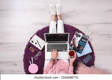 Fashion Blogger With Laptop Sitting On Floor, Top View