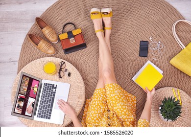 Fashion blogger with laptop sitting on floor, top view - Shutterstock ID 1585526020