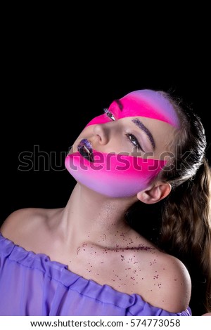 Fashion Blonde Model Portrait.  Professional Makeup. Eyelashes. Purple ahd lilac Make-up. Two fases. Fantastic make up.