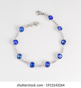 Fashion Blue Sapphire Bracelet On White Background. Jewelry Theme.