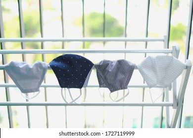 Fashion Cloth Mask Was Washed And Dried On An Aluminum Clothesline.Patient's Room In A Hospital In ASEAN Who Had Washed The Clothes And Closed The Mouth In The Situation Of The Corona Virus.