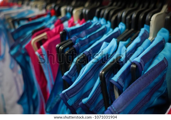 Fashion Clothes On Clothing Rack Bright Royalty Free Stock Image