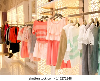 fashion clothing on hangers at the show - Powered by Shutterstock - Get 15% off with code: PIKWIZARD15