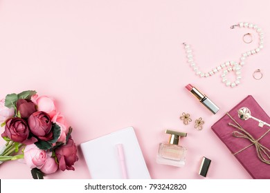 Fashion collection and accessories  flowers  cosmetics   jewelry pink background  copyspace  Womens Day concept