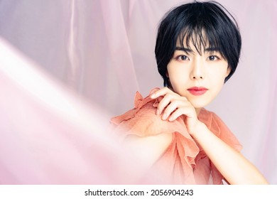 Fashion concept of young Asian woman. Skin care. Cosmetics. Beauty.