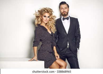 Fashion Couple Looking At The Camera