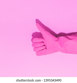 Fashion creative concept with hand in pink rubber glove, showing gesture. Symbol of Yes. Aesthetic abstract minimalism.  - Shutterstock ID 1395343490