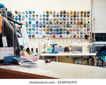 Fashion Design Studio with colourful bobbins Sewing Machine Textile tailor workshop Hobby room  - Powered by Shutterstock