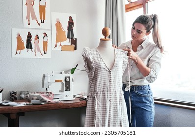 Fashion, design and woman with mannequin, measuring tape and sewing machine at creative small business. Focus, creativity and tailor with dress on doll for clothes, designer in textile startup studio - Powered by Shutterstock