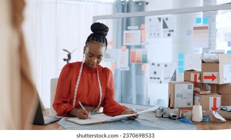 Fashion, designer and black woman with checklist for delivery, logistics and ecommerce in workshop. Retail, boutique and person with boxes for creative startup, small business and supply chain